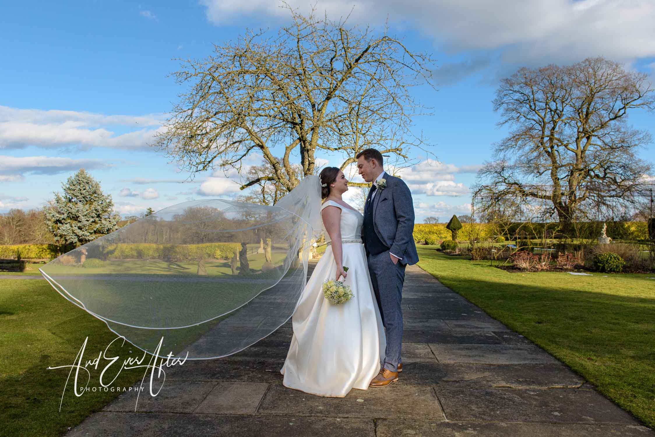 Wedding photographs, bride and groom in grounds of lartington hall