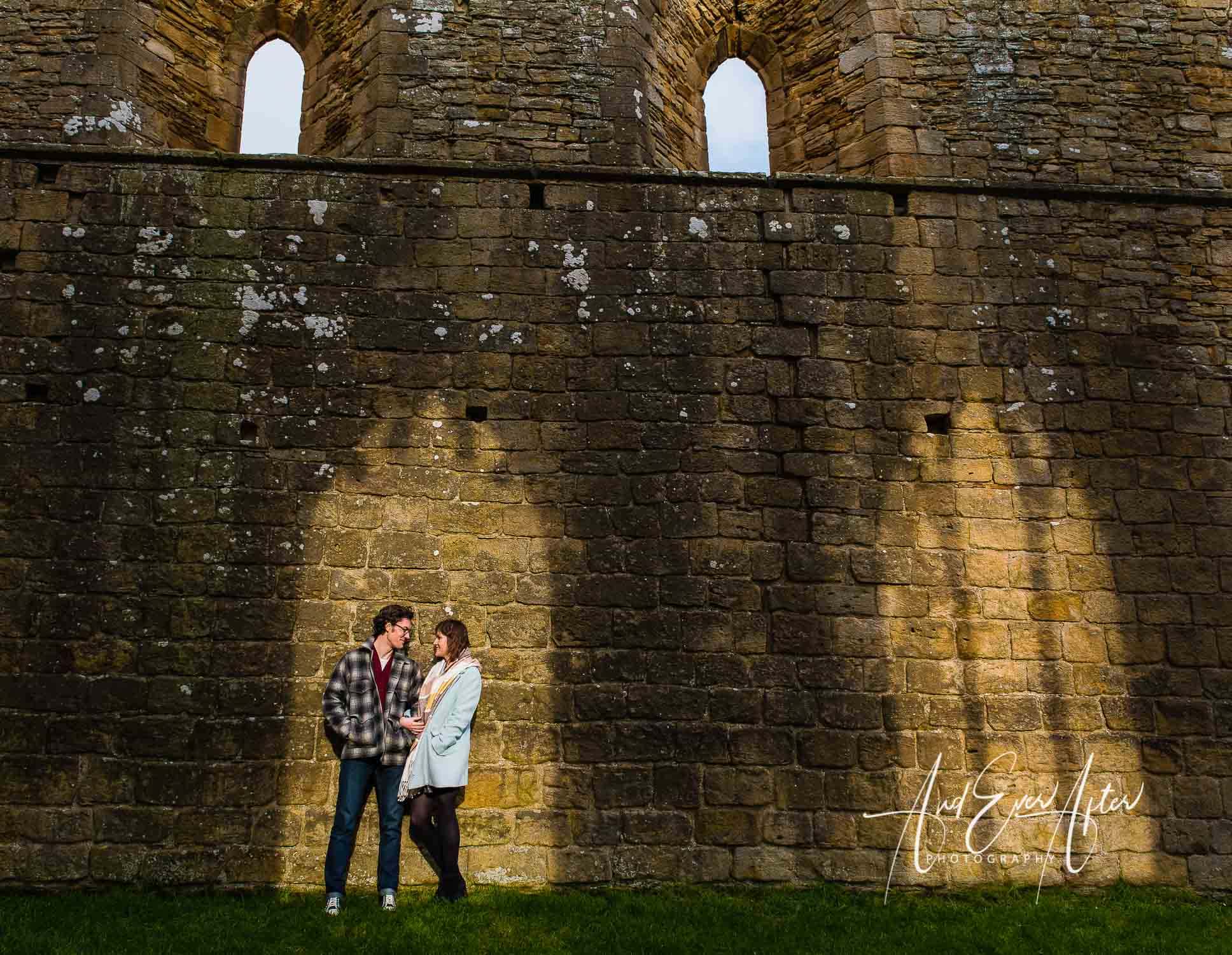 engagement photshoot, bride and groom to be at abbey ruins on photoshoot